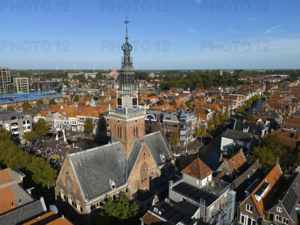 City view with a church tower surrounded by canals and red tiled roofs, aerial view, former city weigh station, Alkmaar, Alkmar, Noord-Holland, North Holland, Netherlands