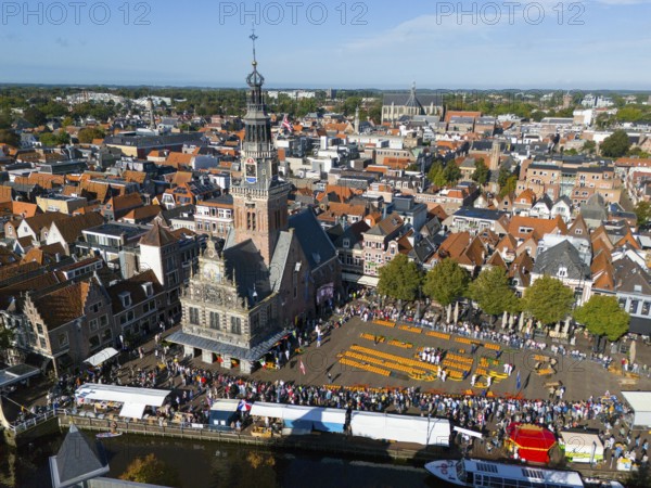 Historic city view with a tower and a busy cheese market in the old town centre, aerial view, cheese, cheese market, former city scales, Alkmaar, Alkmar, Noord-Holland, Noord-Holland, Netherlands