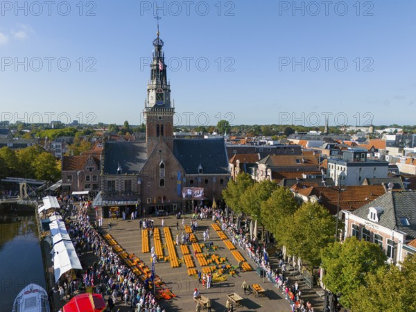 Historic market square with church and crowd under blue sky, aerial view, cheese, cheese market, former city scales, Alkmaar, Alkmar, Noord-Holland, Noord-Holland, Netherlands