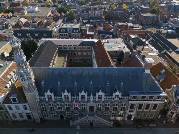 City view of a historic building with striking tower and red tiled roofs, aerial view, town hall, Alkmaar, Alkmar, Noord-Holland, North Holland, Netherlands