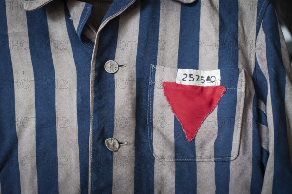 Copy of a blue and grey striped jacket of a concentration camp prisoner with a sewn-on number and red triangle, documentation centre in the old Engelberg tunnel, first motorway tunnel in Germany, 1944 and 1945 production site for wings, Messerschmitt Me 262 fighter aircraft, forced labour, station on the path of remembrance, Leonberg Concentration Camp Memorial, Leonberg, Baden-Württemberg
