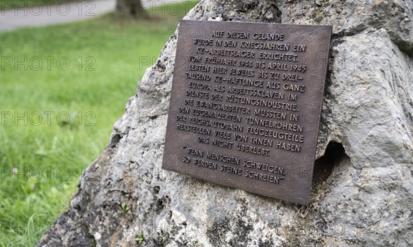 Close-up, stone with memorial plaque to forced labourers in a concentration camp, station on the Path of Remembrance, Leonberg Concentration Camp Memorial, Leonberg, Baden-Württemberg