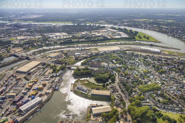 Aerial view, harbour Duisburg Ruhrorter Straße and Kohle-Ringhafen with Karl-Lehr-Brücke, Mercatorinsel with new logistics building site, behind the industrial area Am Blumenkampshof, Ruhrort, Duisburg, Ruhr area, North Rhine-Westphalia, Germany, construction work, construction site, building plots, construction project, building site, DE, Europe, commercial enterprise, commercial area, commercial area, commercial property, commercial site, commercial use, harbour, harbour area, harbour area, industrial area, industrial site, aerial view, aerial photography, aerial photography, new construction, overview, bird's-eye view, birds-eyes view, duisport, overview