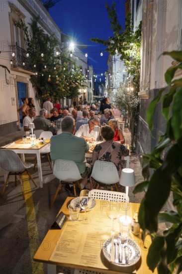 Gastronomy, restaurants in Tavira, old town, partly streets, alleys are closed and serve as terraces for the restaurants, in the east of the Algarve, Portugal