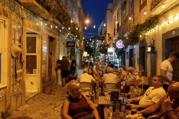 Gastronomy, restaurants in Tavira, old town, partly streets, alleys are closed and serve as terraces for the restaurants, in the east of the Algarve, Portugal