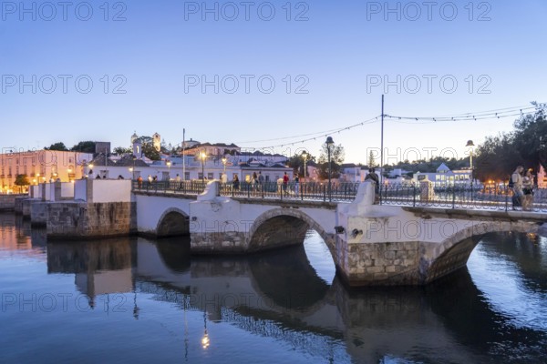 The seven-arched bridge over the Rio Gilão, in Tavira, old town, in the east of the Algarve, Portugal