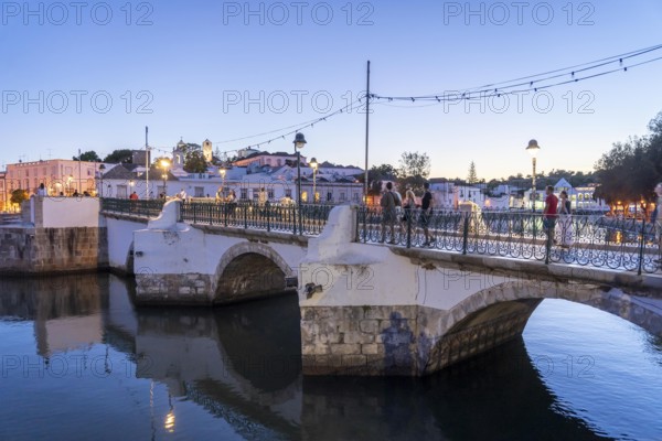 The seven-arched bridge over the Rio Gilão, in Tavira, old town, in the east of the Algarve, Portugal