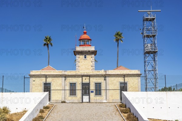 Ponta da Piedade lighthouse on the Ponta da Piedade rocky coast, rugged coastal landscape, right next to the centre of Lagos, in the west of the Algarve, Portugal