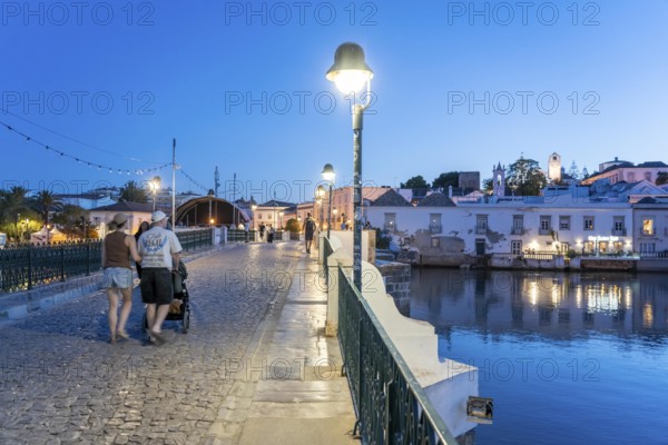 The seven-arched bridge over the Rio Gilão, in Tavira, old town, in the east of the Algarve, Portugal