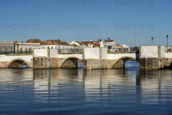 The seven-arched bridge over the Rio Gilão, in Tavira, old town, in the east of the Algarve, Portugal
