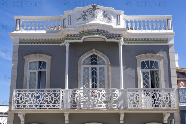 Facade of buildings in Tavira, old town, in the east of the Algarve, Portugal