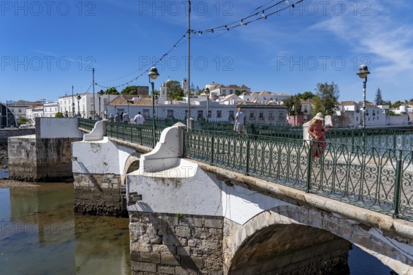 The seven-arched bridge over the Rio Gilão, in Tavira, old town, in the east of the Algarve, Portugal