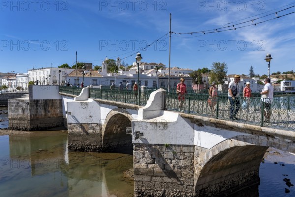 The seven-arched bridge over the Rio Gilão, in Tavira, old town, in the east of the Algarve, Portugal