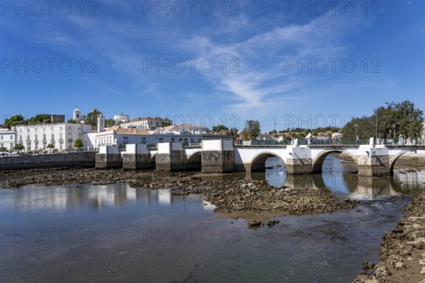 The seven-arched bridge over the Rio Gilão, in Tavira, old town, in the east of the Algarve, Portugal