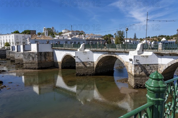 The seven-arched bridge over the Rio Gilão, in Tavira, old town, in the east of the Algarve, Portugal