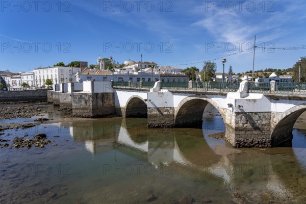 The seven-arched bridge over the Rio Gilão, in Tavira, old town, in the east of the Algarve, Portugal