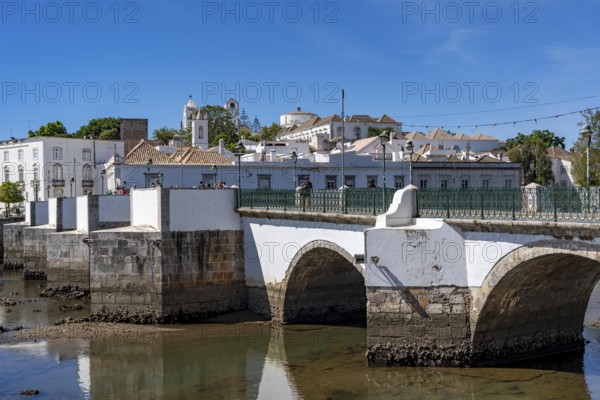 The seven-arched bridge over the Rio Gilão, in Tavira, old town, in the east of the Algarve, Portugal