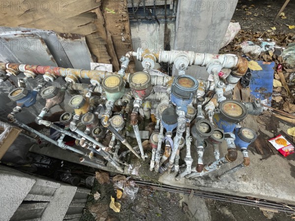 Infrastructure, water pipes and water meters of various houses, San Carlos, Negros Occidental, Philippines