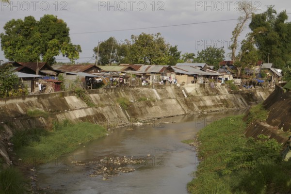 Poor neighbourhood near San Carlos, corrugated iron flats, Negros Occidental, Philippines