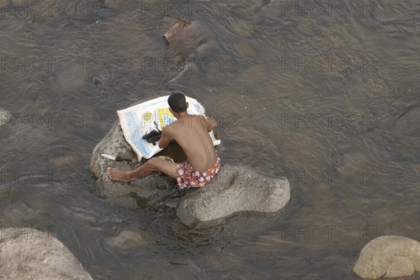 Fisherman has caught catfish, Negros Occidental, Philippines