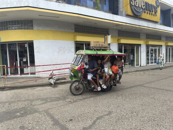 Many people in a motorbike taxi, taxi, motorbike, public transport, mobility, service, transport, Negros Occidental, Philippines