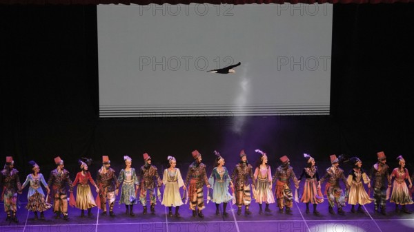 Members of Fire of Anatolia, also known as Anadolu Atesi, bow to the audience after their performance at Gaziantep University. The troupe enjoys worldwide fame and holds Guinness World Records for its achievements, Gaziantep, Gaziantep, Türkiye