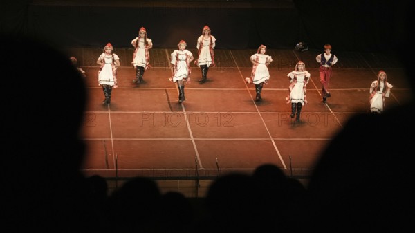 Young dancers from Fire of Anatolia perform a folkloric sequence in Gaziantep, wearing costumes inspired by Anatolian village traditions. The Turkish dance ensemble is among the largest in the world, with about 120 members performing globally, Gaziantep, Gaziantep, Türkiye