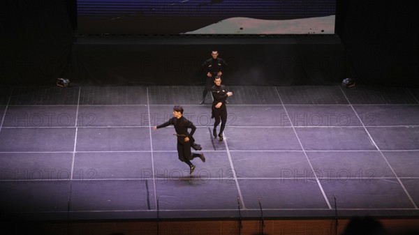 Male dancers from Fire of Anatolia perform the traditional Lezginka dance in Gaziantep, showcasing energetic jumps, fast spins, and powerful gestures. The Caucasian folk dance is widely recognized across Georgia and eastern Türkiye, Gaziantep, Gaziantep, Türkiye