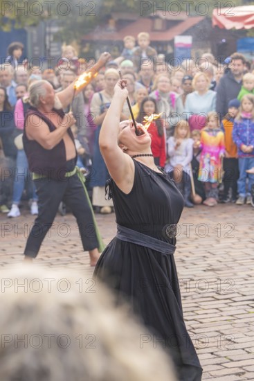 Fire-eating performance in front of a large audience on a square, Sindelfingen, Böblingen district, Germany