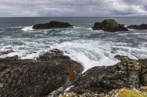 Rocky coast, offshore islands, Ballintoy Harbour, Causeway Coastal Route, Antrim, Northern Ireland, Great Britain