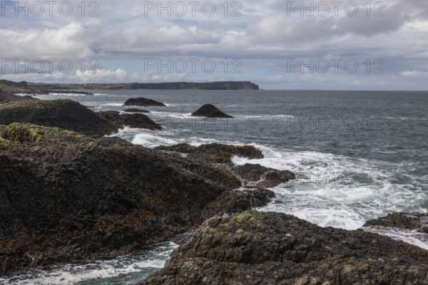 Rocky coast, offshore islands, Ballintoy Harbour, Causeway Coastal Route, Antrim, Northern Ireland, Great Britain