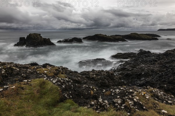 Rocky coast, offshore islands, Ballintoy Harbour, Causeway Coastal Route, Antrim, Northern Ireland, Great Britain