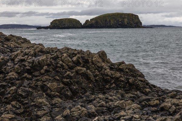 Rocky coast, offshore islands, Ballintoy Harbour, Causeway Coastal Route, Antrim, Northern Ireland, Great Britain