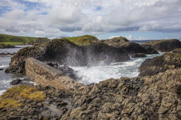Breakwater at the fishing harbour, Ballintoy Harbour, Causeway Coastal Route, Antrim, Northern Ireland, Great Britain