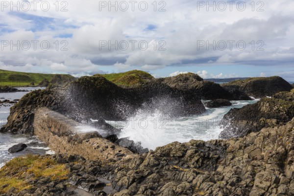 Breakwater at the fishing harbour, Ballintoy Harbour, Causeway Coastal Route, Antrim, Northern Ireland, Great Britain