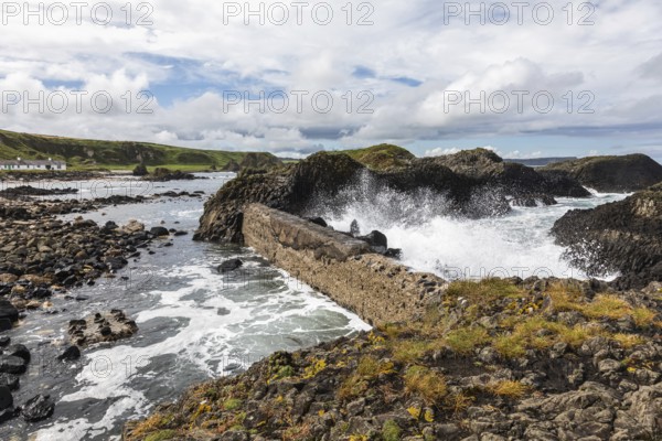 Breakwater at the fishing harbour, Ballintoy Harbour, Causeway Coastal Route, Antrim, Northern Ireland, Great Britain