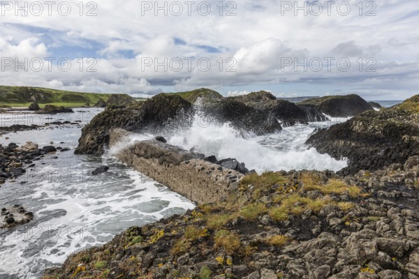 Breakwater at the fishing harbour, Ballintoy Harbour, Causeway Coastal Route, Antrim, Northern Ireland, Great Britain