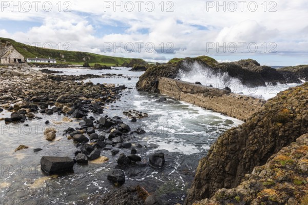 Breakwater at the fishing harbour, Ballintoy Harbour, Causeway Coastal Route, Antrim, Northern Ireland, Great Britain
