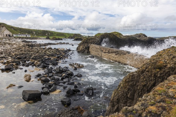 Breakwater at the fishing harbour, Ballintoy Harbour, Causeway Coastal Route, Antrim, Northern Ireland, Great Britain