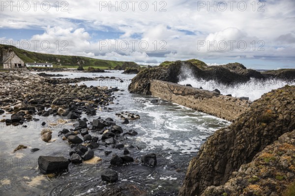 Breakwater at the fishing harbour, Ballintoy Harbour, Causeway Coastal Route, Antrim, Northern Ireland, Great Britain