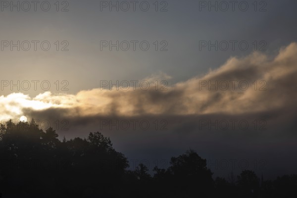 Clouds over a range of hills, Leoben, Styria, Austria