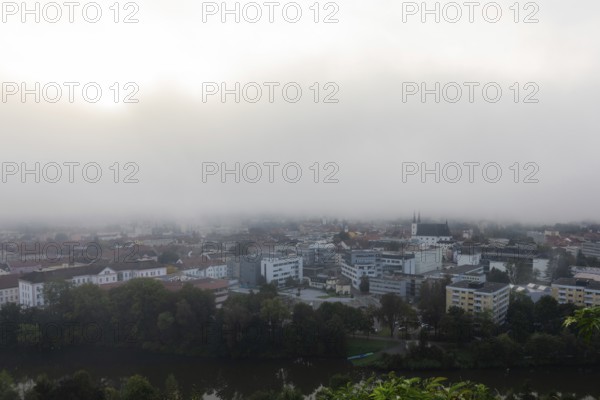 The city of Leoben in the early morning fog, Leoben, Styria, Austria