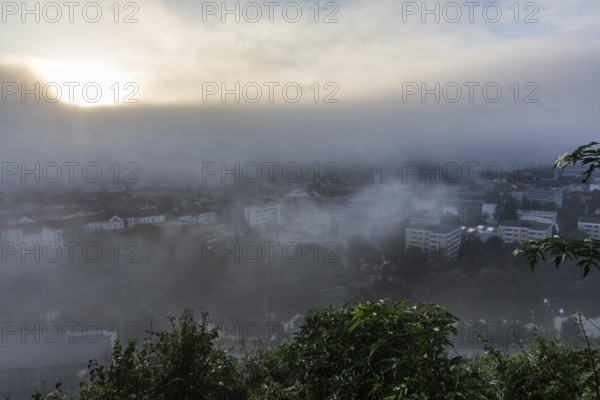 The city of Leoben in the early morning fog, Leoben, Styria, Austria