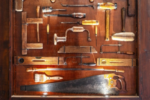 Plenty of different carpenter's tools exhibited and illuminated in the museum, Malta