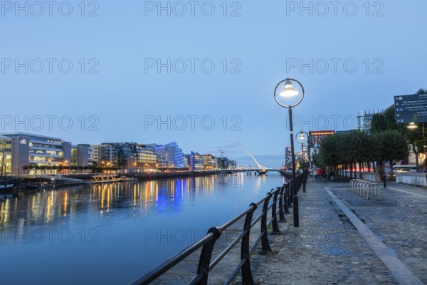 View of the River Liffey and houses on the banks, blue hour, Dublin, Ireland