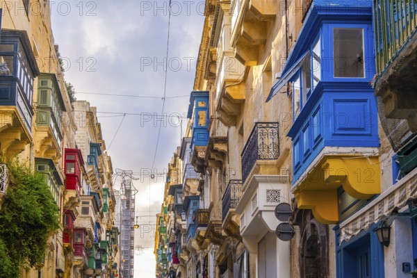 Wonderful historic houses with colorful wooden balconies in La Valletta, capital city of Malta