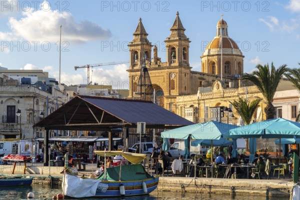 Beautiful view of Marsaxlokk, traditional maltese fisherman village on south of the island, Malta
