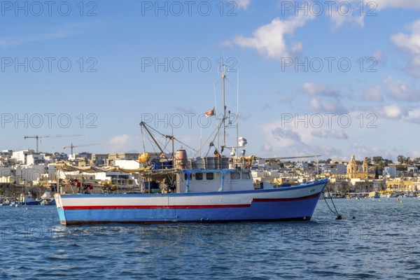 Beautiful view of Marsaxlokk, traditional maltese fisherman village on south of the island, Malta