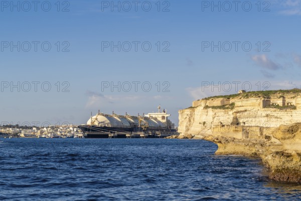 Floating Storage Unit or FSU next to power station by Marsaxlokk, south of Malta