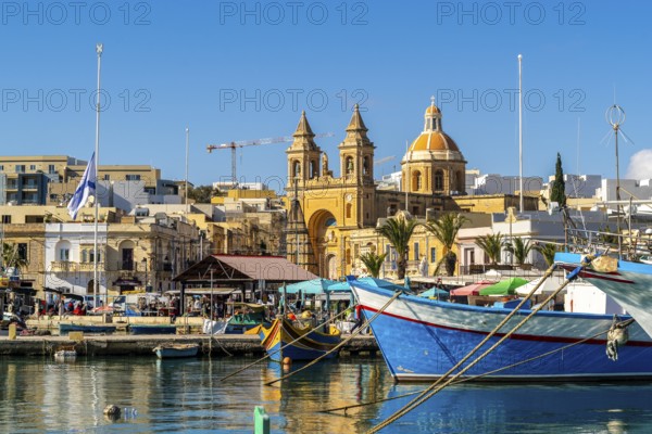 Beautiful view of Marsaxlokk, traditional maltese fisherman village on south of the island, Malta